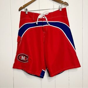NHL Monetral Candiens Red White and Blue Board Shorts. Size Medium.